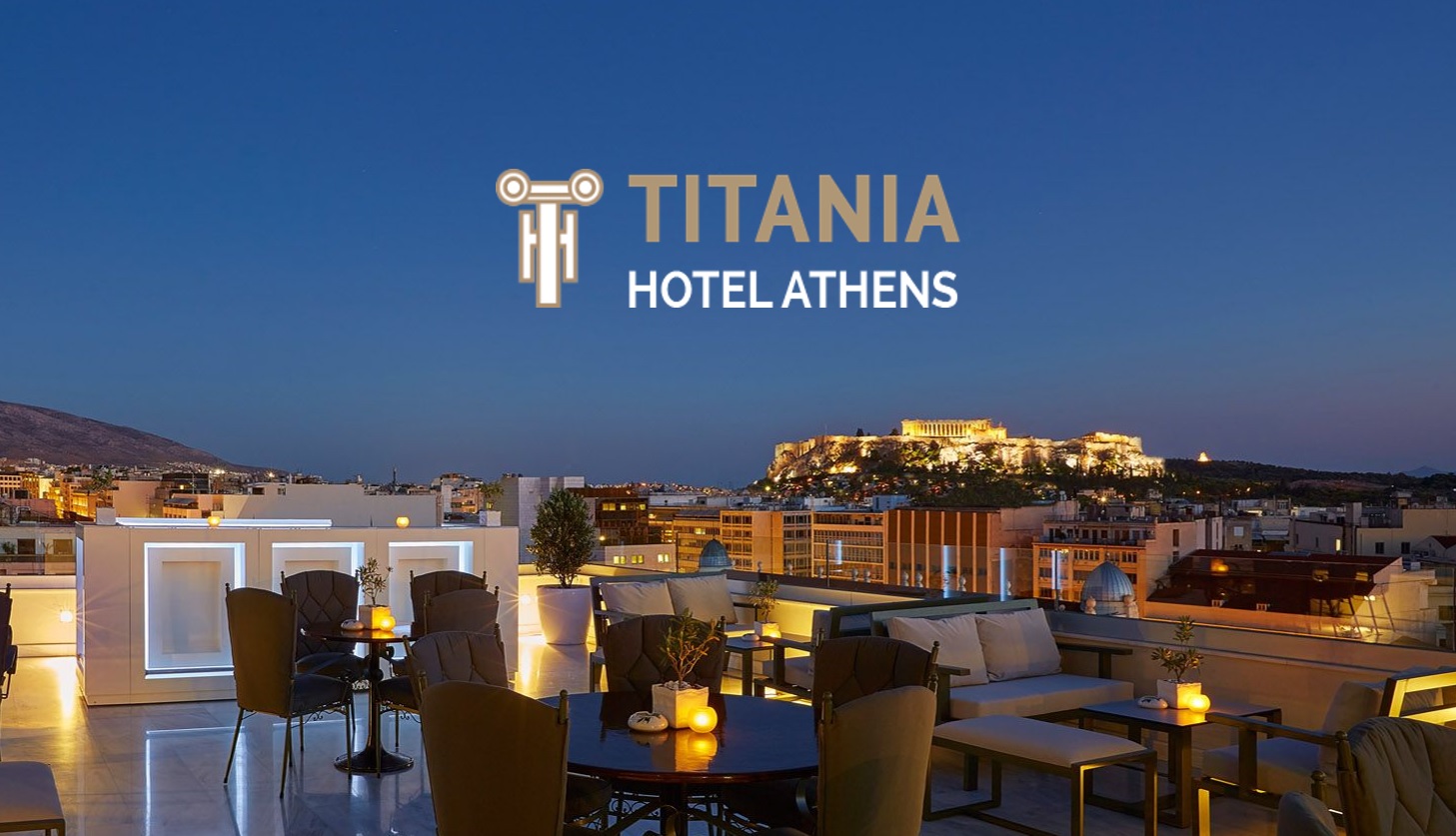 A picture of the top deck of Hotel Titania overlooking the city with the Acropolis in the background.